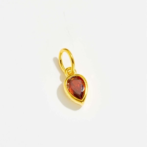 Golden teardrop pendant with red faceted gemstone and micro-pave S925 silver eye