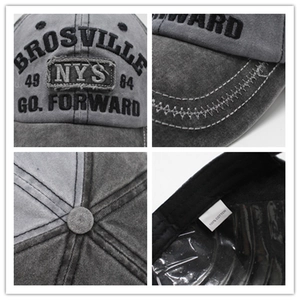 Vintage washed dark grey cotton baseball cap with retro embroidery and distressed details