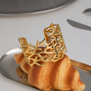 Irregular branch coral open cuff bangle in 18K gold plated titanium steel on croissant