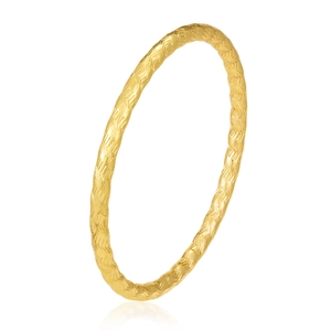 Detailed view of golden hollow bangle with intricate woven texture and herringbone pattern