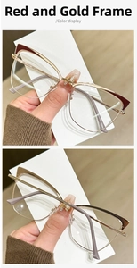 Detailed close-up of cat-eye metal glasses frame in red and gold finish