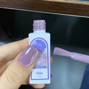 Detail of purple cat eye nail polish N06 Bellflower on nails with 7ml bottle