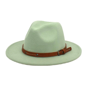 Detail of mint green wool fedora hat featuring a brown faux leather belt with metal buckle