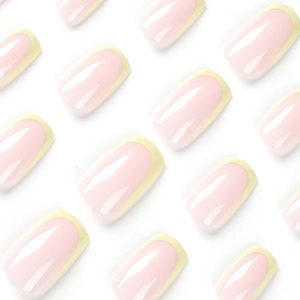 Classic square French press-on nails in pale yellow and nude pink with a glossy finish