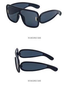 Fashion shield sunglasses for women with thick frames and oversized grey lenses from two angles