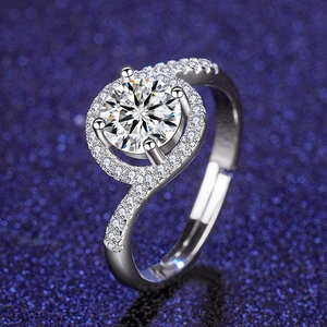 Detailed view of round zircon halo ring with twisted band and adjustable open design