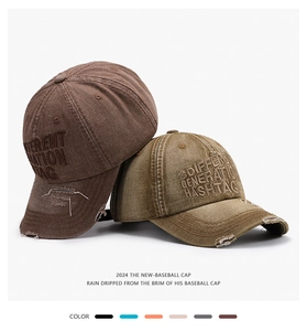 Detailed macro view of vintage distressed baseball cap with 3D embroidery and worn edges