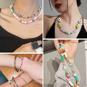Colorful DIY beaded jewelry set including pearl bracelets and phone charms for craft kits