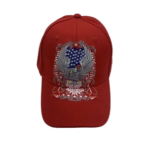 Close-up of intricate eagle and American flag embroidery on a red cotton baseball cap