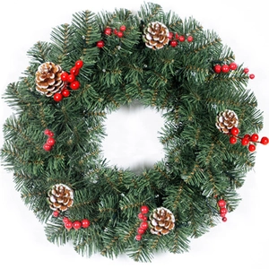 Christmas wreath with green pine needles, red berries, snowy cones and LED lights