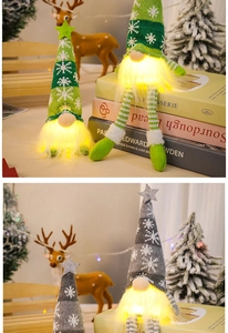 Detail of a glowing Christmas gnome with knitted snowflake hat and long dangling legs