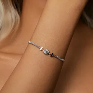Elegant 925 sterling silver woven bracelet with a brilliant round moissanite center stone