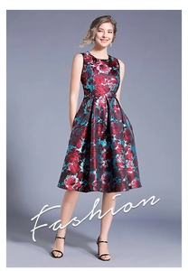 Detail of red rose floral jacquard fabric on elegant sleeveless waist-tie dress