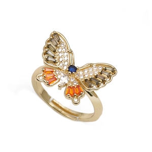 Adjustable gold butterfly ring featuring multi-colored cubic zirconia stones on white background