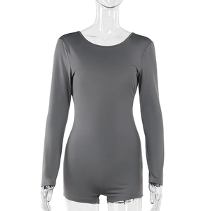 Detail showing backless long-sleeve dark grey bodysuit on a transparent mannequin