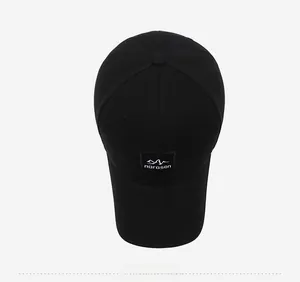 Close-up of black cotton baseball cap showing detailed twill texture and narason embroidery