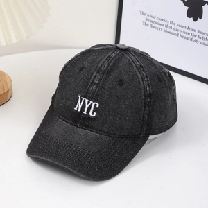 Vintage washed dark grey denim baseball cap with white NYC embroidery in a casual style