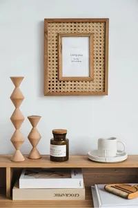 Detailed close-up of a 5x7 solid wood photo frame with natural rattan woven backing texture