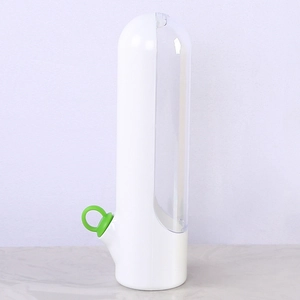 Side view of white automatic pet feeder with transparent storage tank and green pull ring