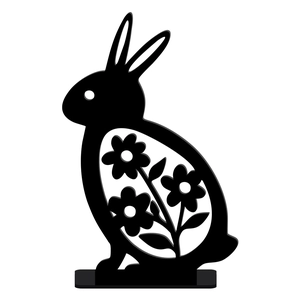 Detail of a black acrylic Easter bunny figurine with intricate floral cutout patterns
