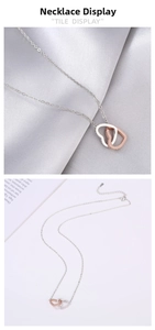 Detail of rose gold and silver intertwined heart necklace with sparkling crystals