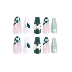 Press-on nails set with green checkerboard patterns and 3D white bows on long coffin shape
