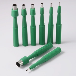 Set of 8 green handle clay hole cutters with various sizes for pottery crafting