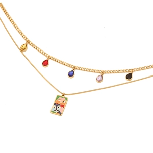 Double-layered gold necklace with five teardrop gems and abstract enamel pendant