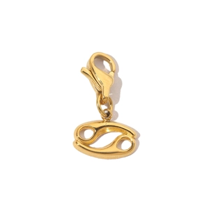 Detailed macro view of 14K gold-plated Cancer zodiac pendant with lobster clasp attachment