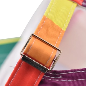 Detail of colorful striped baseball cap strap with silver metal adjustable buckle