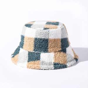 Detail of checkered teddy fleece bucket hat showing thick plush texture and warm material