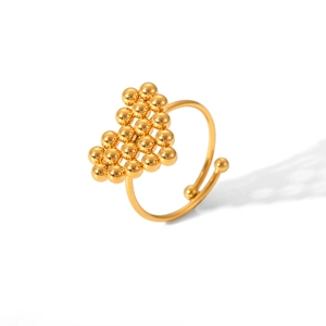 Detailed shot of a 18K gold stainless steel heart ring made with beaded ball textures