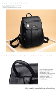 Close-up of black faux leather backpack featuring a metal kangaroo logo and pebble texture