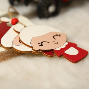 Christmas wooden Santa and Mrs. Claus ornaments for tree decoration with red beads