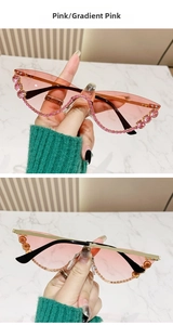 Detail of pink gradient cat-eye sunglasses with luxury rhinestone and floral stud accents