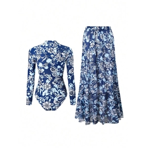 Blue and white floral two-piece swimsuit set with long sleeve bodysuit and maxi skirt