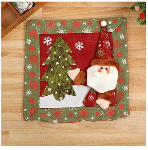 Close-up of linen Christmas pillowcase featuring Santa Claus and tree embroidery