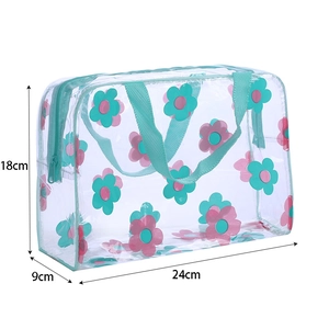 Transparent floral PVC toiletry bag with cyan handles, size 24x18x9cm, waterproof design