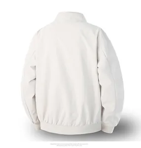 Detail of white casual executive jacket with ribbed cuffs and windproof texture