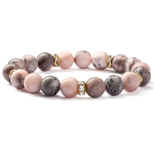 Detailansicht der rosa-grauen Marmorperlen mit goldenen Kristall-Zwischenstücken am Armband