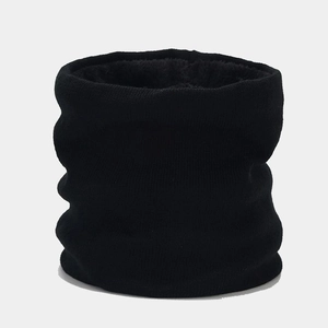 Detail of black winter neck warmer with knitted exterior and soft fleece lining