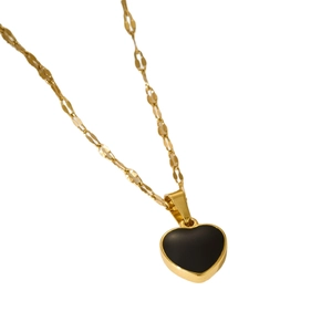 Golden heart necklace with black onyx pendant on a minimalist thin chain jewelry