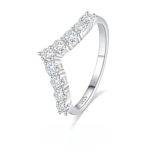 Macro shot of V-shaped S925 sterling silver ring with sparkling white zircon stones