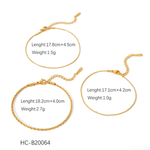 Detailed view of gold stainless steel snake, twist, and bead chain bracelets with sizes