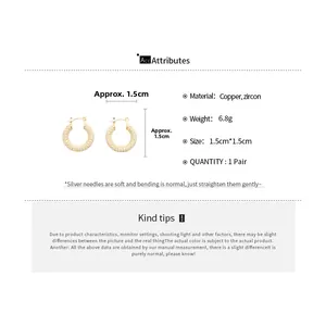 Detailed view of U-shaped gold plated earrings with cubic zirconia pave setting