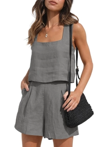 Detailed close-up of grey linen two-piece set featuring square neck tank top and shorts