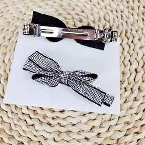 Elegant bow hair clips set with sparkling crystals and black fabric for women's hairstyle