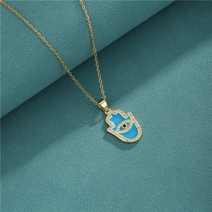 18K gold plated Hamsa Hand necklace with blue enamel and evil eye zircon pendant