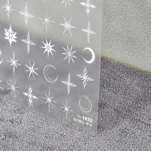 Detail of TO-1932 thin nail stickers with white star and moon magic patterns