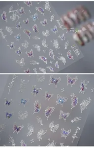 Macro shot of 5D butterfly nail decals TL-089 with embossed stars and pearl accents